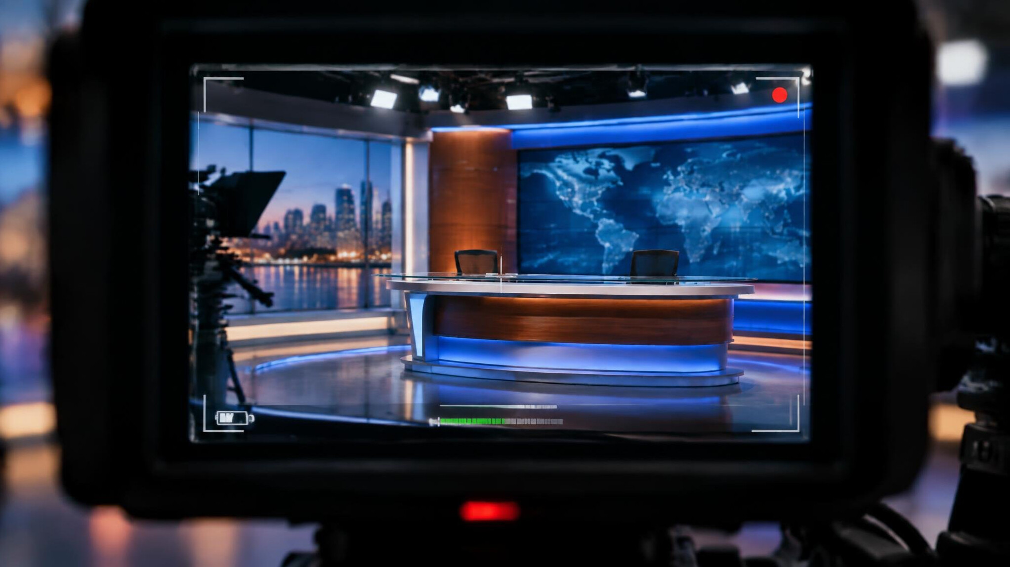 View through a broadcast camera viewfinder of a studio set